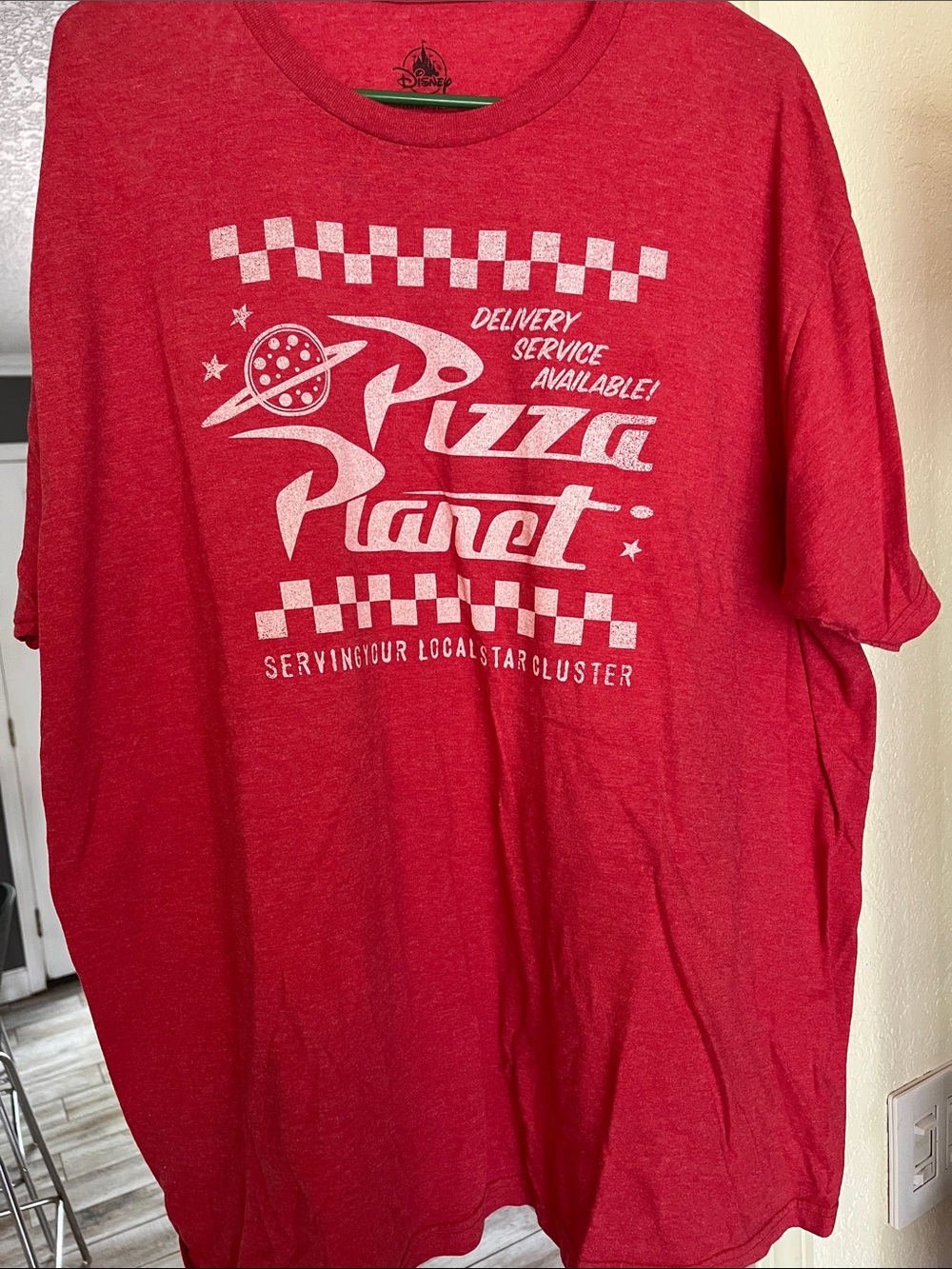Disney Pixar and Toy Story.         Red Pizza Planet Graphic Tee